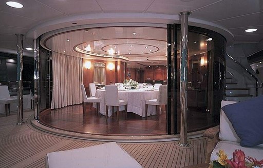 Benetti motor yacht MORE dining area leading onto deck