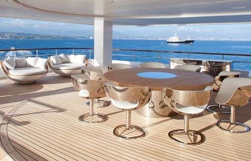 Exterior seating area onboard charter yacht AIR