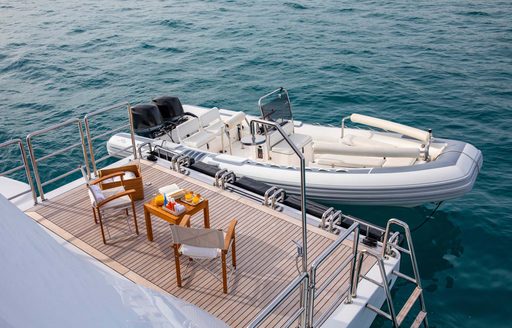 Swim platform and tender with charter yacht LA BLANCA