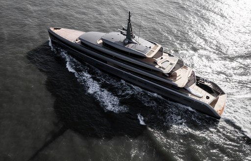 Elevated view looking down at M/Y OBSIDIAN underway, surrounded by sea.