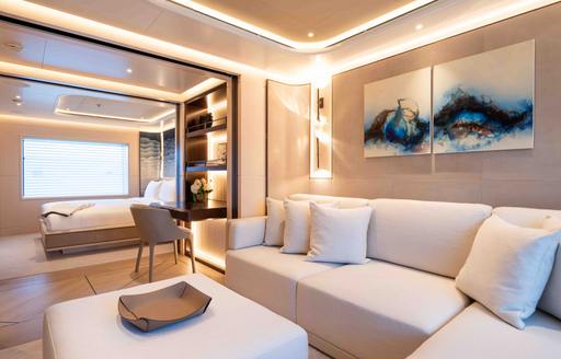 Superyacht charter SYMMETRY VIP suite lounge seating