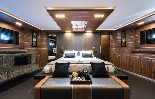 large bed and sky light in master suite on board charter yacht Rox Star 