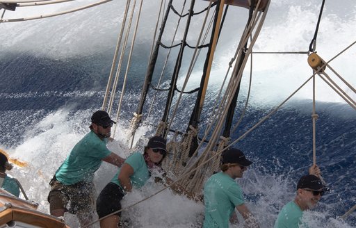 Sailors being splashed at regatta in Antigua