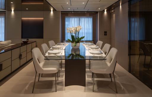 Interior dining area onboard charter yacht CANOE CANOE
