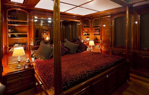 four poster bed in double cabin of motor yacht steel