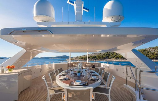 Sundeck dining onboard MY Lammouche