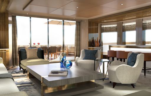 Comfortable seats around table of superyacht MOSKITO