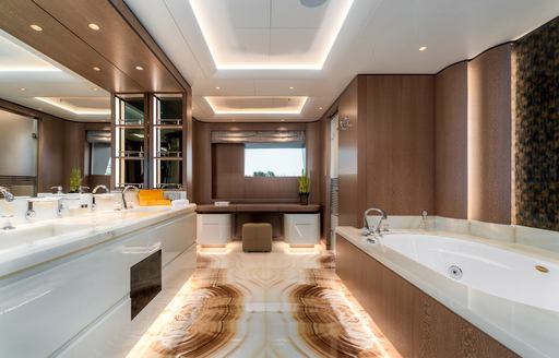 Ensuite on superyacht O'PARI, with bath visible to the right and sink to the left