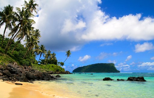 Islands in the south pacific with sandy beach and blue sea