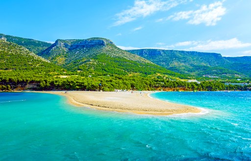 Golden Horn; sandy beach at Bol on Brac island of Croatia in summertime