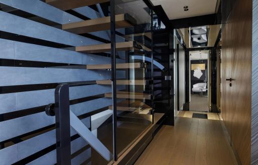 Charter yacht SHE'S A 10 TOO interior floating staircase