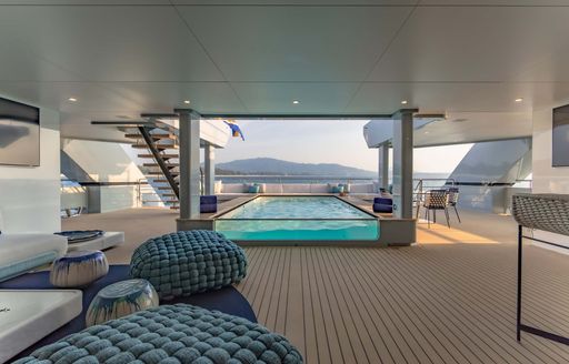 Deck Jacuzzi and exterior seating onboard charter yacht SPACE CAT