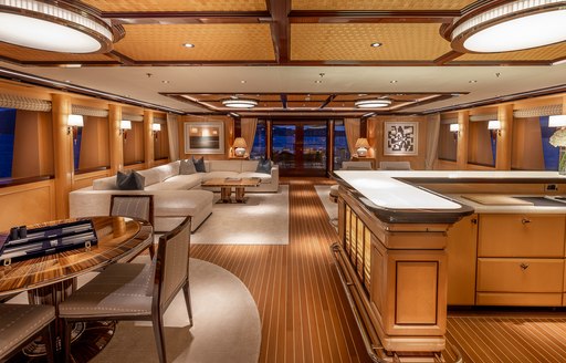 Superyacht charter ROCK.IT interior wet bar and seating area