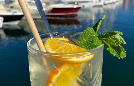 Cocktail on a wall by a marina
