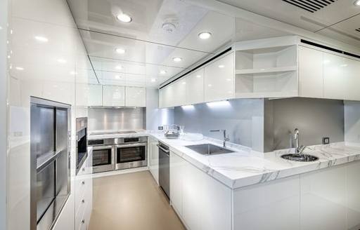 Lightly colored galley area on explorer yacht 'Seven Diamonds'