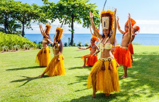 Dancers perform their traditional ceremonial welcome in Tahiti, French Polynesia