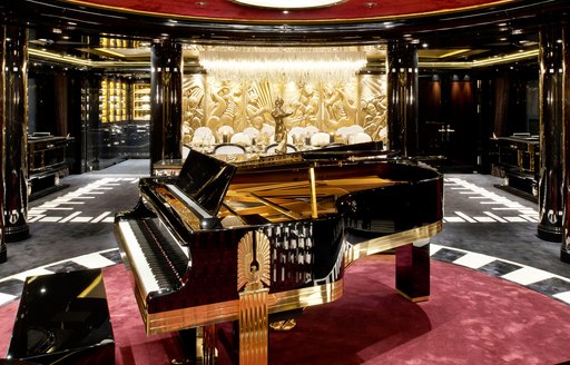 Grand piano in main salon on luxury yacht Phoenix 2