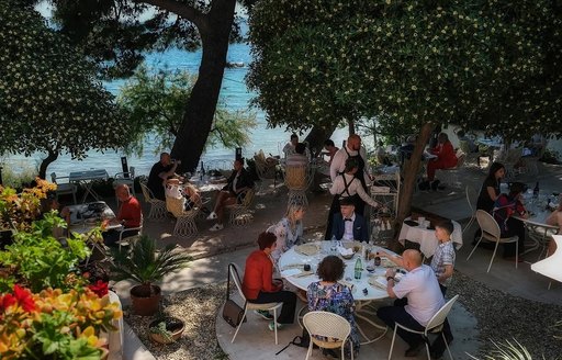 Croatian restaurant Dvor outside seating and guests