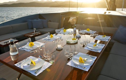 forward cockpit on board superyacht SARISSA set for dinner