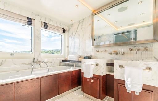 Charter yacht VICTORY ensuite with bath tub and twin sinks