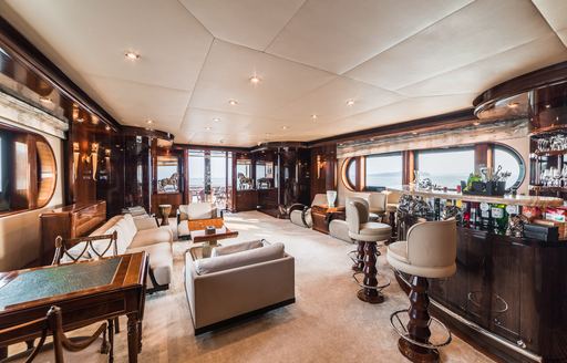 Charter yacht ASHENA upper salon with wet bar