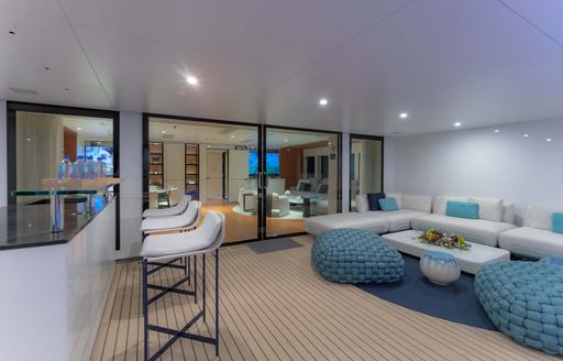 Interior wet bar and seating onboard charter yacht SPACE CAT