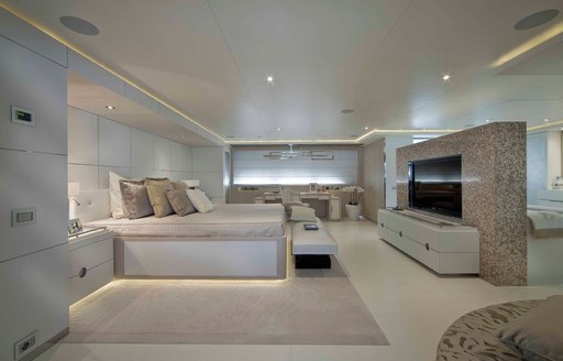 owners cabin on crn yacht light holic with large tv and bed