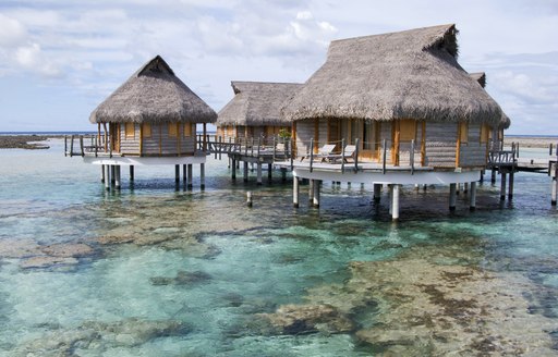 Overwater bungalows in the South Pacifc islands