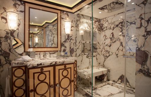 En suite with extensive marble onboard charter yacht PLAN B