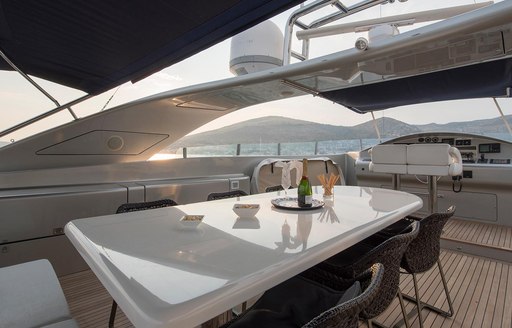 Luxury yacht One Blue dining area on sundeck