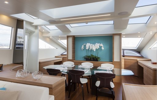 Main dining table and chairs on superyacht 55 FIFTYFIVE