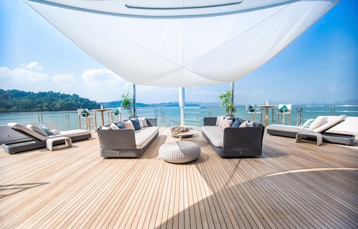 bridge deck aft under sun awnings with alfresco lounging on board superyacht SALUZI