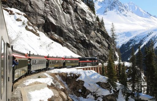 White Pass & Yukon Route Railway train snowy cliffside