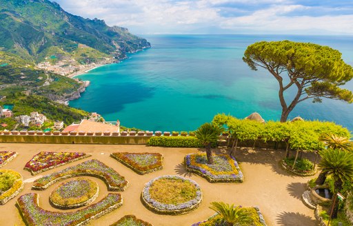 Lovely tree-lined flowery gardens overlooking the sea on the Amalfi Coast