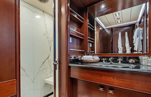 Guest cabin ensuite with sink unit and mirror onboard luxury yacht charter GALILEO