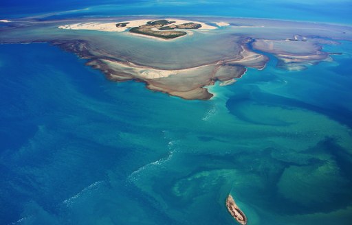 aerial view of Montgomery Reef with blue seas in Australia