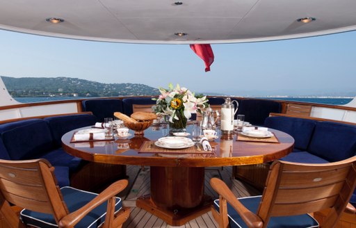 al fresco dining area on the aft deck of superyacht Secret Life 