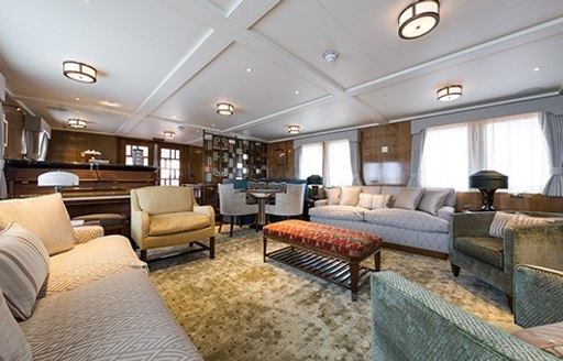 Main salon in 1930s style on board motor yacht Malahne