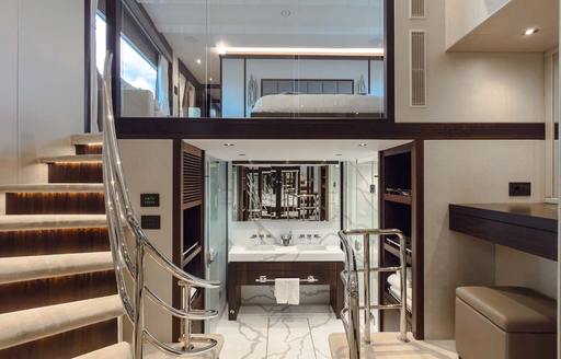 Charter yacht NIGORA interior with staircase