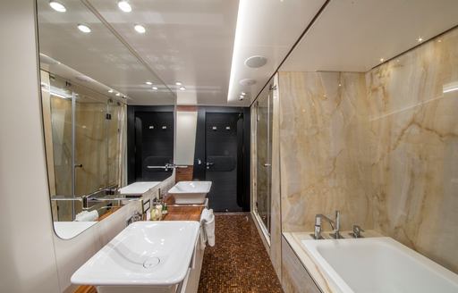 Charter yacht KATINA guest cabin en suite with sink unit and bath