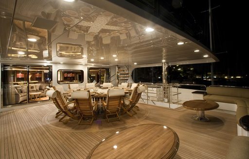 Alfresco dining on the deck of motor yacht MILESTONE