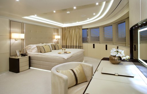 full-beam master suite radiates understated elegance on board charter yacht ROMA