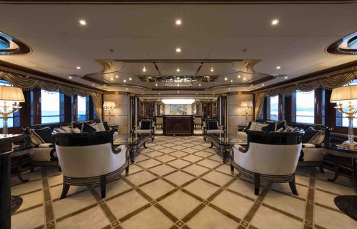 The grid carpet and seating featured inside of superyacht 'Mine Games'