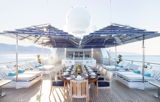 dining arranegement on sundeck of lurssen superyacht titania