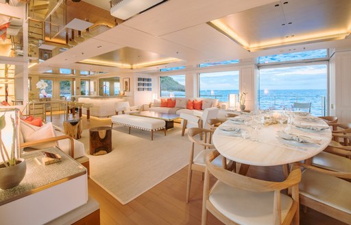 Luxury charter yacht DRIFTWOOD main salon and formal dining table