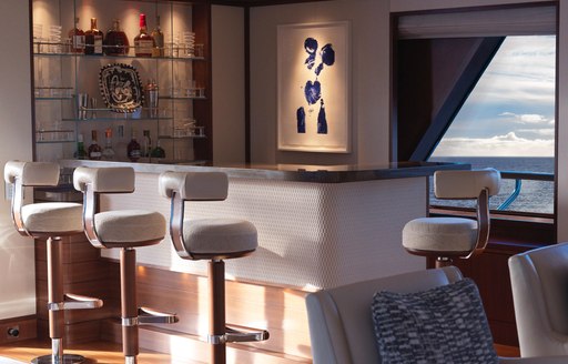 Charter yacht SOLACE wet bar with stools