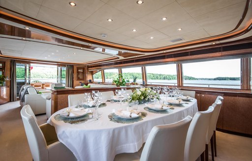 Fully laid dining table on Superyacht Queen of Sheba