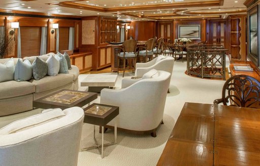 The dark oak fixtures and the cream furnishings featured on board superyacht UNBRIDLED