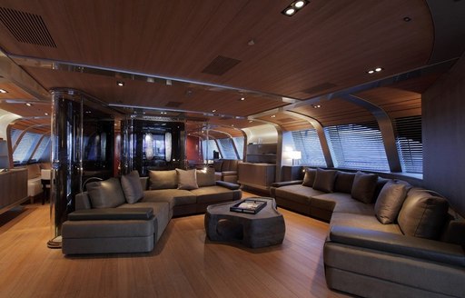 large sofa in main salon of charter yacht SEAHAWK