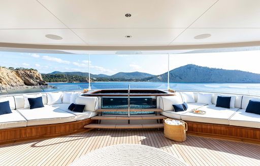 Deck Jacuzzi and adjacent white seating onboard superyacht charter SOPHIA